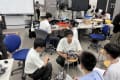 愛工大名電高校訪問、交流会の模様。熱心にロボットについて説明をしていただき受講生も大満足でした。