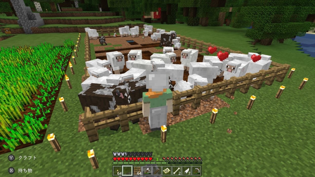 羊の群れの隣に立っている人がいるマインクラフトゲーム