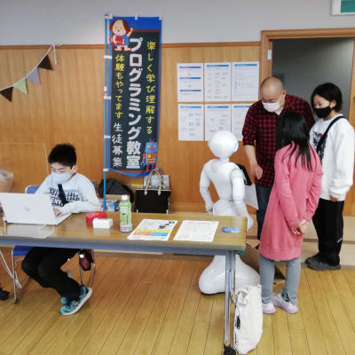 イベントで会場案内するPepper