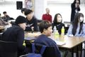 N Code Laboの生徒さん保護者さんたち。綺麗な教室で和気藹々と授業しています