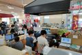 地域のスーパーマーケットで学習の成果を披露