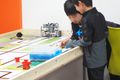 チームを組んで大会に向けてミーティング