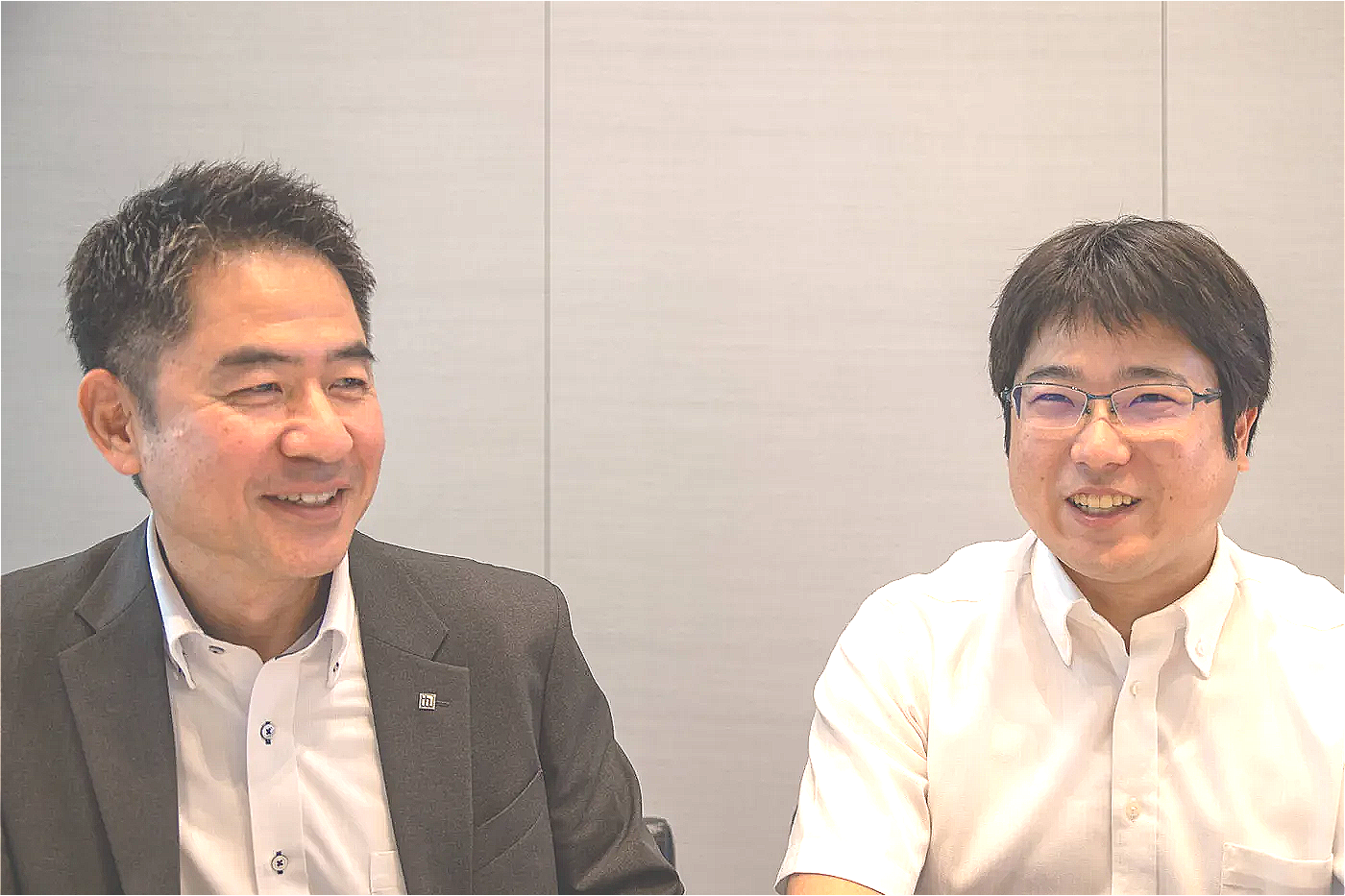 メカトロニクス・ソリューション部 自動化施工推進室 室長・出石陽一氏、主任・佐藤周平氏