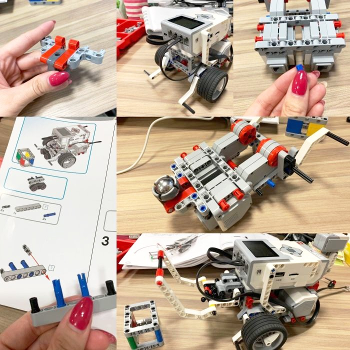 ピンクの爪を持つ女性がレゴでロボットを作っています